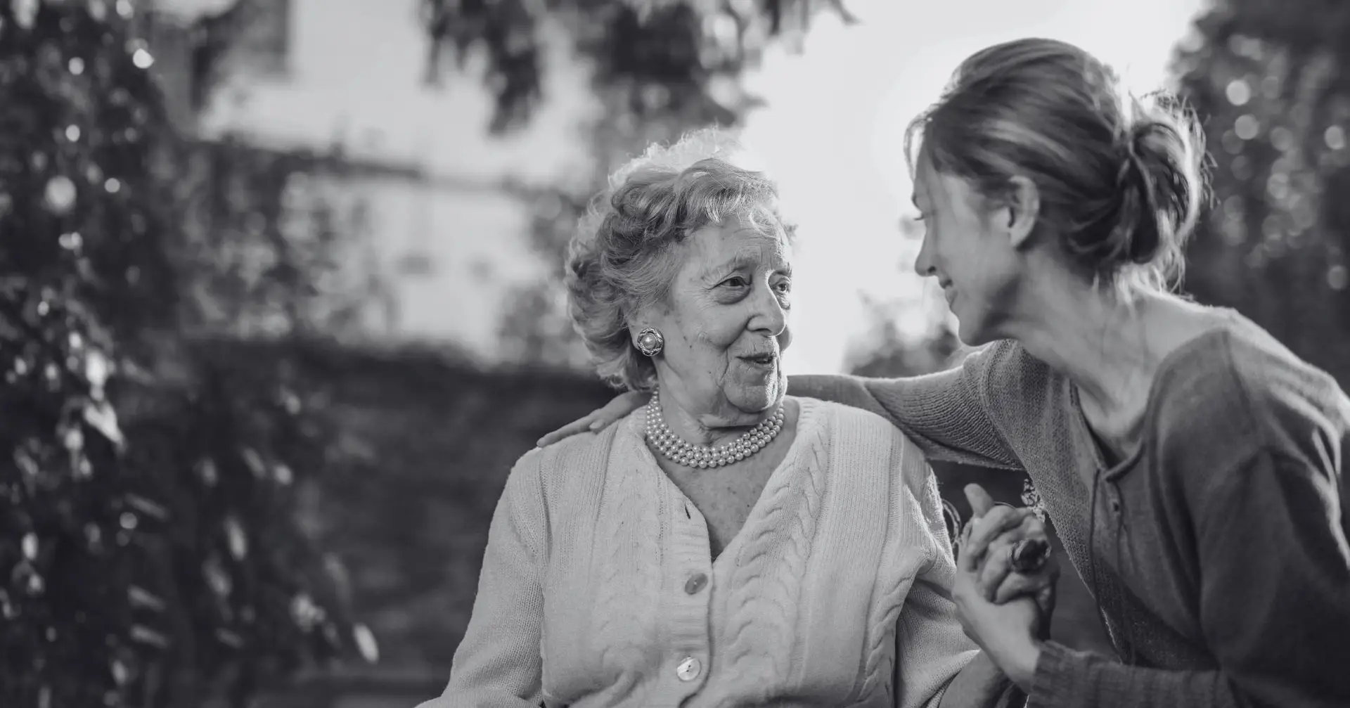 Older lady and middle aged woman embracing – Eleven Legal power of attorney services